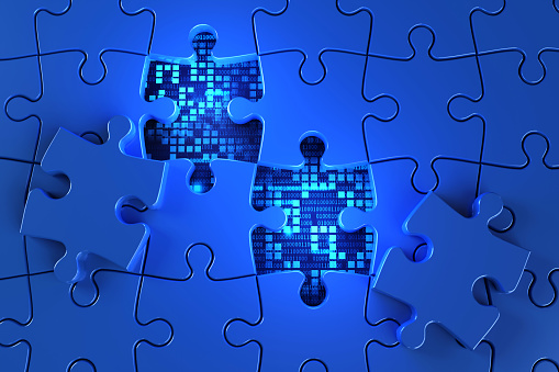 Blue jigsaw puzzle from the panel shows a background of tech code numbers. concept of technology and important parts for program design and business online network connection