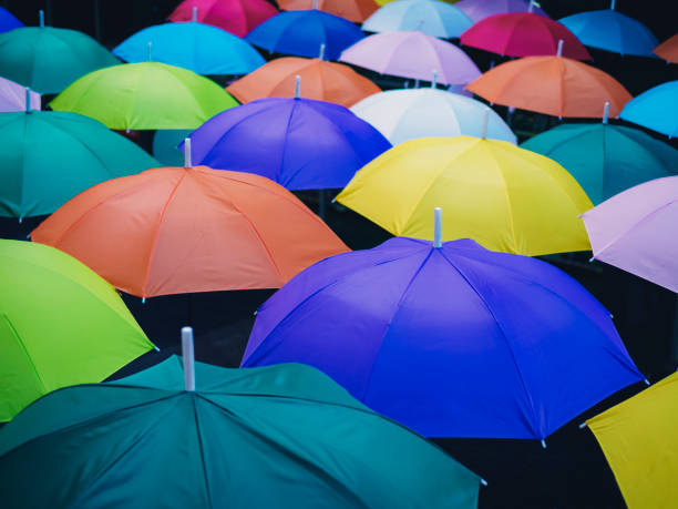 istock Colourful umbrellas Art decoration background 1665266957