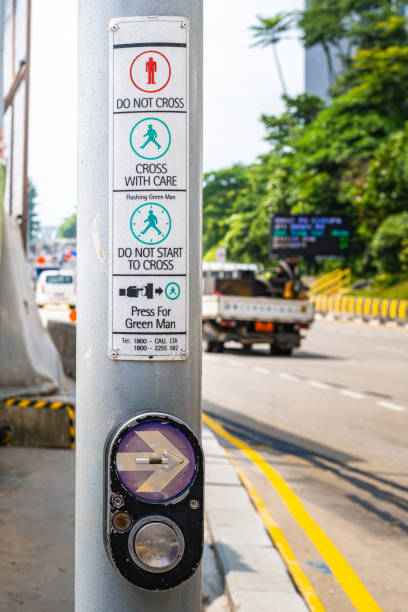 istock Close up button at traffic lights on pedestrian crossing 1665282144
