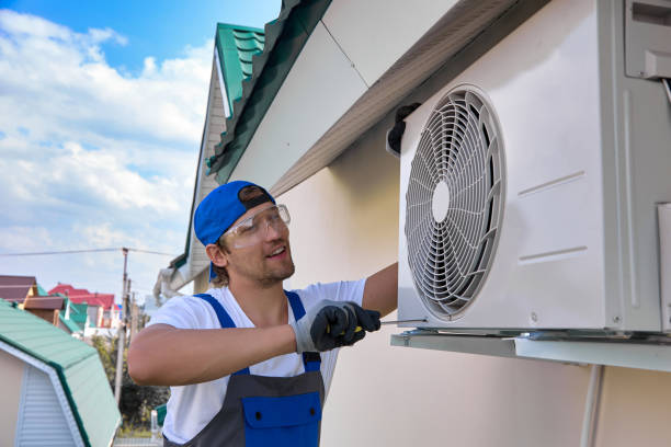 istock Qualified electrician repairs the air conditioning unit installed under the roof 1665344718