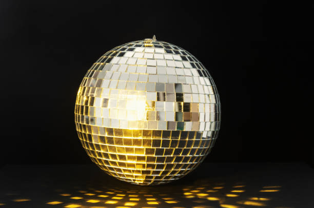 istock Disco ball with flashing lights on a black background 1665367468
