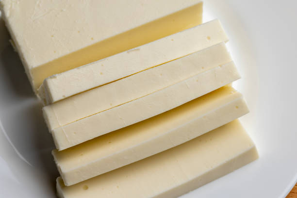 istock Sliced cream cheese for salads 1665371346