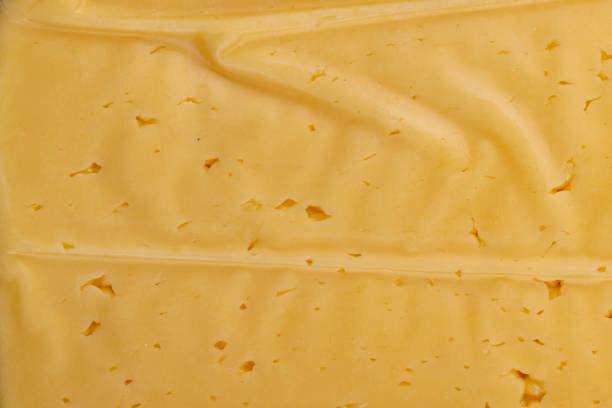 istock semi- hard cheese with holes cut into chunks 1665373109