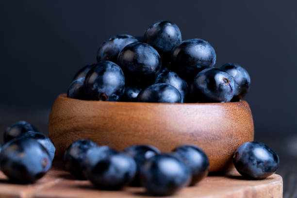 istock Unwashed blue grapes in the dust 1665376002
