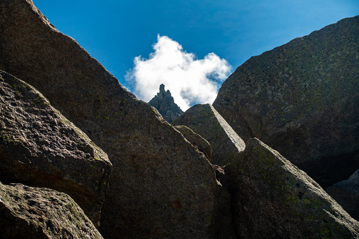 Kinner Kailash Shivling amidst towering rocks in Himachal Pradesh. Part of Hindu pilgrimage, Kinner Kailash Yatra