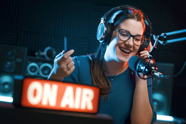 istock Presenter working at the radio station 1665384543