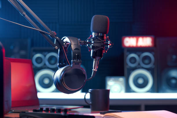 Headphones and mic at the radio station stock photo