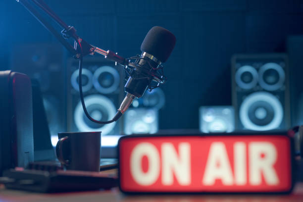 Professional radio station equipment and On Air sign stock photo