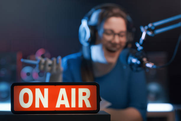 istock Presenter working at the radio station 1665404840
