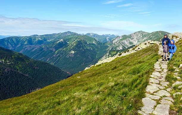 istock Summer Tatra Mountain (Poland) and family on path 166542227