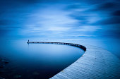 Curve of the Jetty and Man