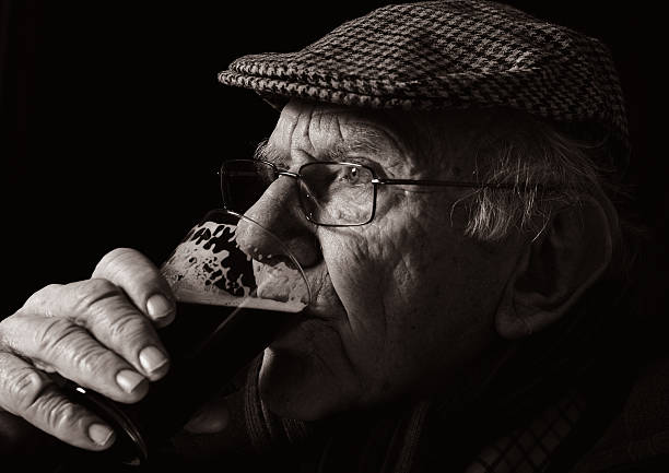 1672 Old Man Drinking Beer Stock Photos Pictures  Royalty