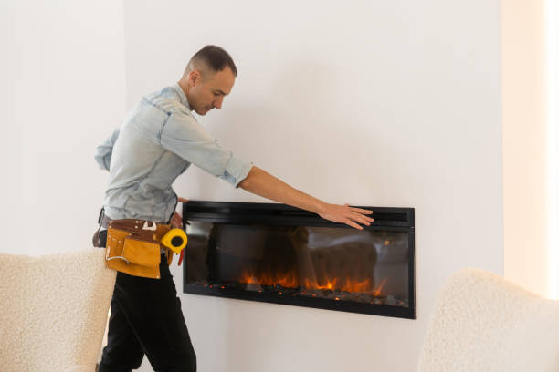 istock fireplace worker, installation and repair 1665430734