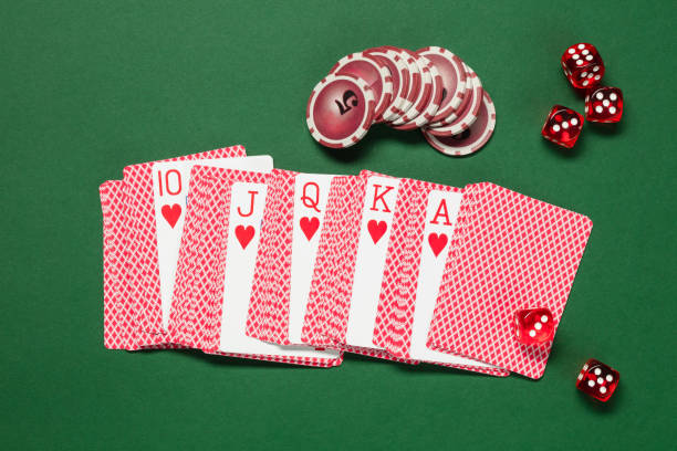 istock Playing cards, playing chips and red dice. Poker casino. 1665432199