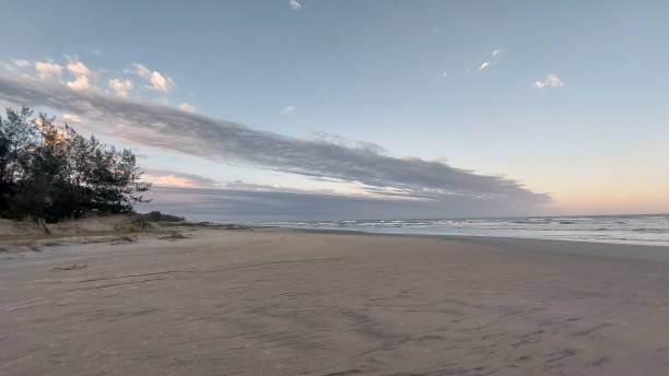 istock Sunset on the beach in Brazil 1665438347