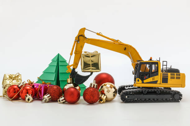 istock Christmas ornament and Excavator model 1665467396
