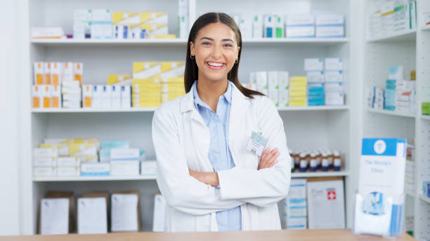 istock Portrait of a cheerful and friendly pharmacist using a digital tablet to check inventory or online orders in a chemist. Young latino woman using pharma app to do research on medication in a pharmacy 1665471232