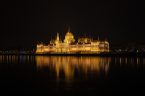 Budapest cityscape with parliament building at night.