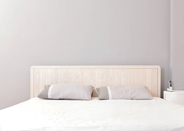 istock Modern bedroom styled with pale wood and greys 166548546