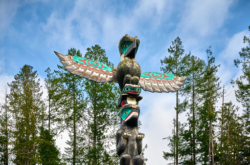 First Nations totem pole, carvings by Northwest Coast First Peoples. Sechelt Nation. Sunshine Coast, British Columbia, Canada. Skookumchuck Narrows Provincial Park