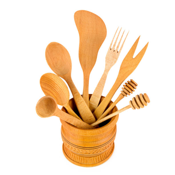 istock Set of wooden kitchenware isolated on white background. 1665560841