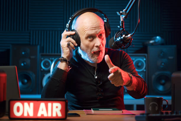istock Confident radio DJ talking into the mic 1665607601