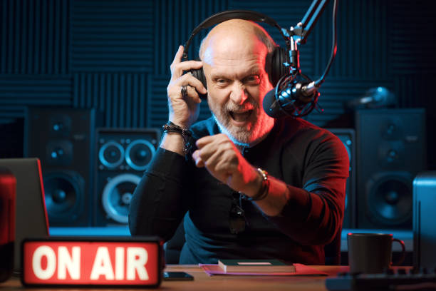 istock Confident radio DJ talking into the mic 1665614944