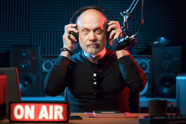 istock Surprised radio presenter working in the studio 1665619190
