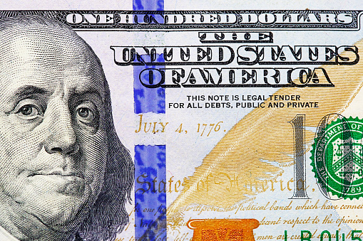 US hundred-dollar bill in extreme close-up.