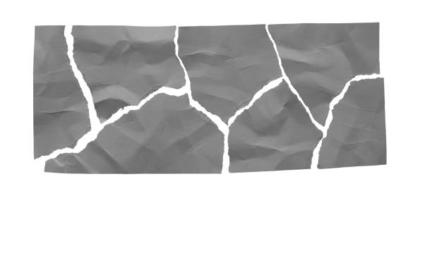 istock One rectangular piece of paper torn into pieces, rendered in mid-gray to make it easy to overlay your images or copy 1665632474