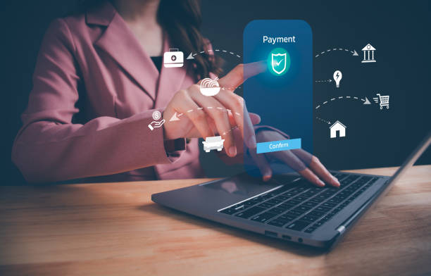 istock Woman using computer laptop online payment with icons on virtual screen, mobile banking and online shopping. Technology online banking applications via. Digital online payment, financial transaction. 1665634847