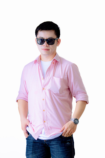 Asian man wearing sunglasses on background,Portrait of handsome young asian man wearing sunglasses, summer vacation concept