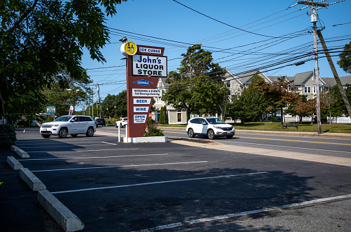Views of two small businesses in nFalmouth, MA on Cape Cod.  As the summer season is winding down, many parking lots are empty.