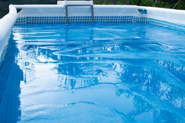 istock Swimming Pool with  solar film covers the pool. 1665672065
