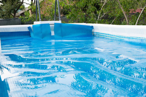 istock Swimming Pool with  solar film covers the pool. 1665672067