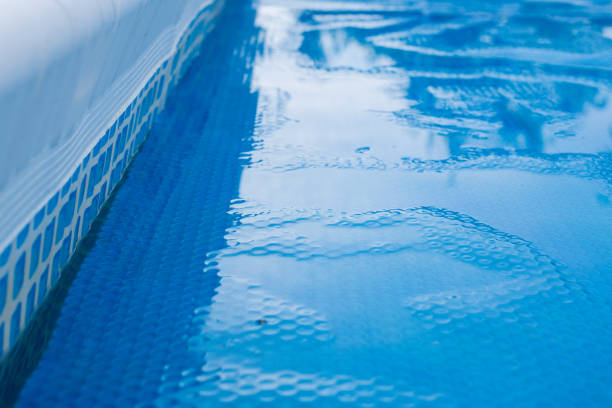 Swimming Pool with  solar film covers the pool.