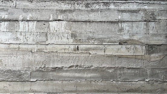 Untreated concrete walls reveal a unique texture.