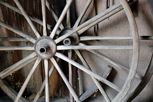 Closeup of vintage wooden wagon wheel