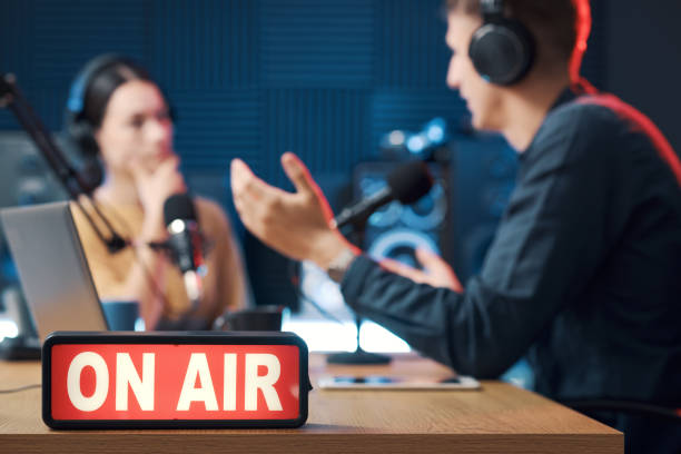 Interview at the radio broadcasting studio stock photo