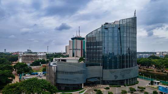 Bank head office building with surrounding streets and greenery