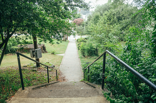 This is a photograph from the top of a staircase descending into Washington Park in Macon, Georgia.