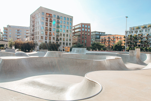 Urban landscape. The skate park in the city of Malmö on the background of buildings