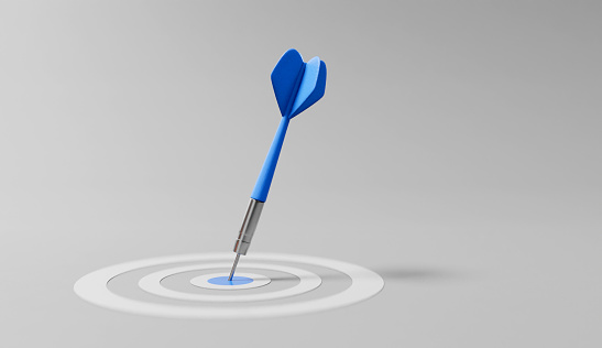Dart arrow on center of dartboard, metaphor to target success, winner concept,competitive advantage, strategic marketing concept, 3D render