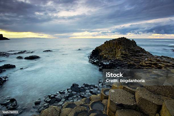 Beautiful Sunset At The Famous Giants Causeway Stock Photo - Download Image Now - Basalt, Beach, Beauty