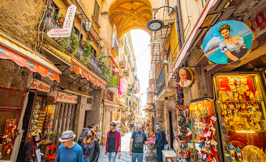 Naples, Italy - 10 May, 2023: Via San Gregorio Armeno street and Neapolitan souvenirs market, historic center of the city