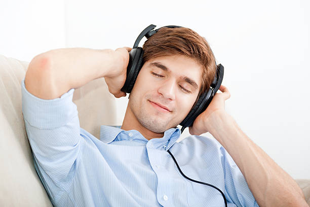 istock Man listening music 166576513
