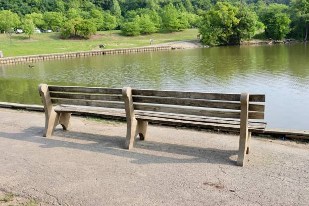 istock Park Bench at the Lake 1665766956