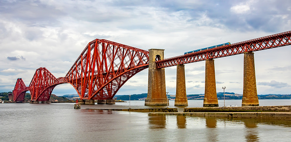 The Forth Bridge in Scotland, connects North and South Queensferry villages, picturesque railway bridge was opened in 1890