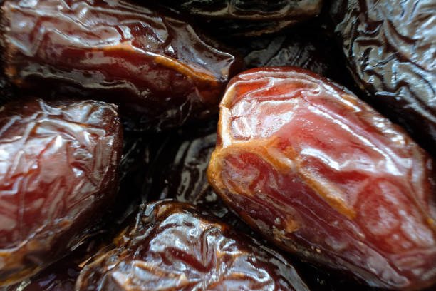 istock Macro image of dried dates with limited focus 1665776199