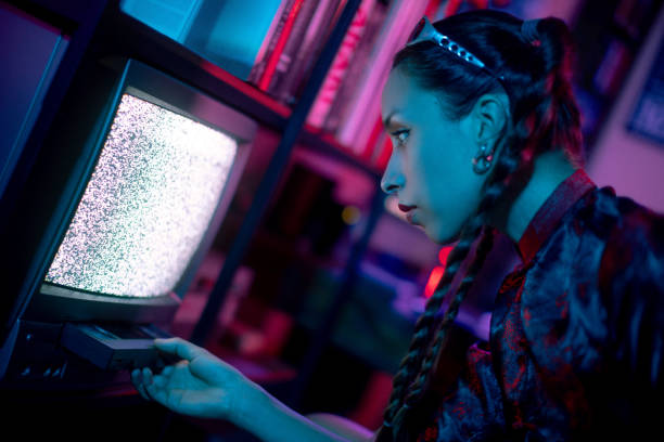 istock Young woman under neon colored lights 1665781112